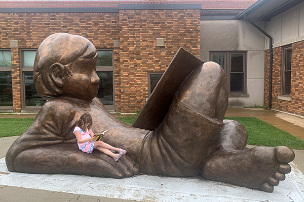 Huge Kid Reading a Book in Detroit Lakes, Minnesota